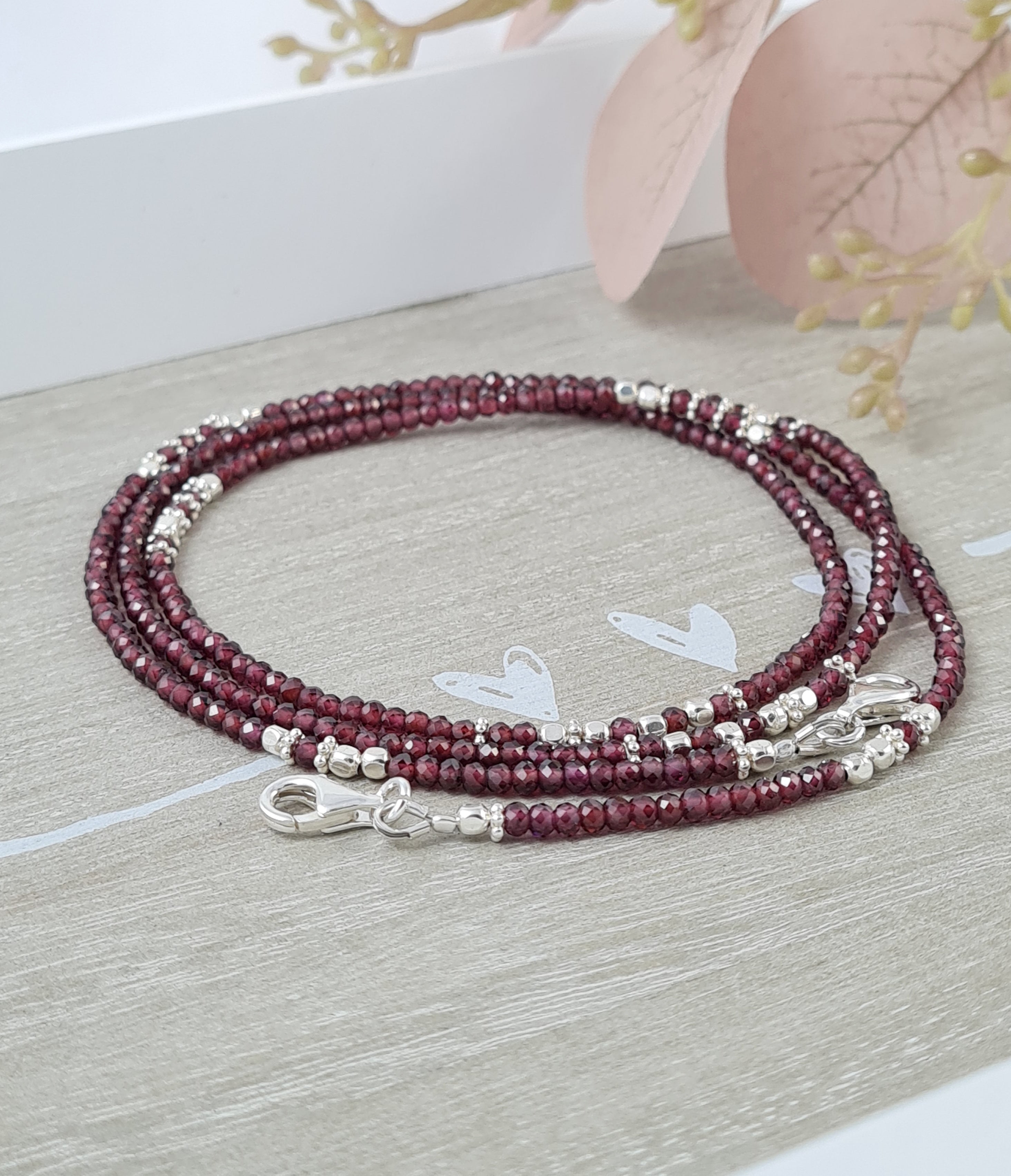 Brillenkette aus Granat und Silber *