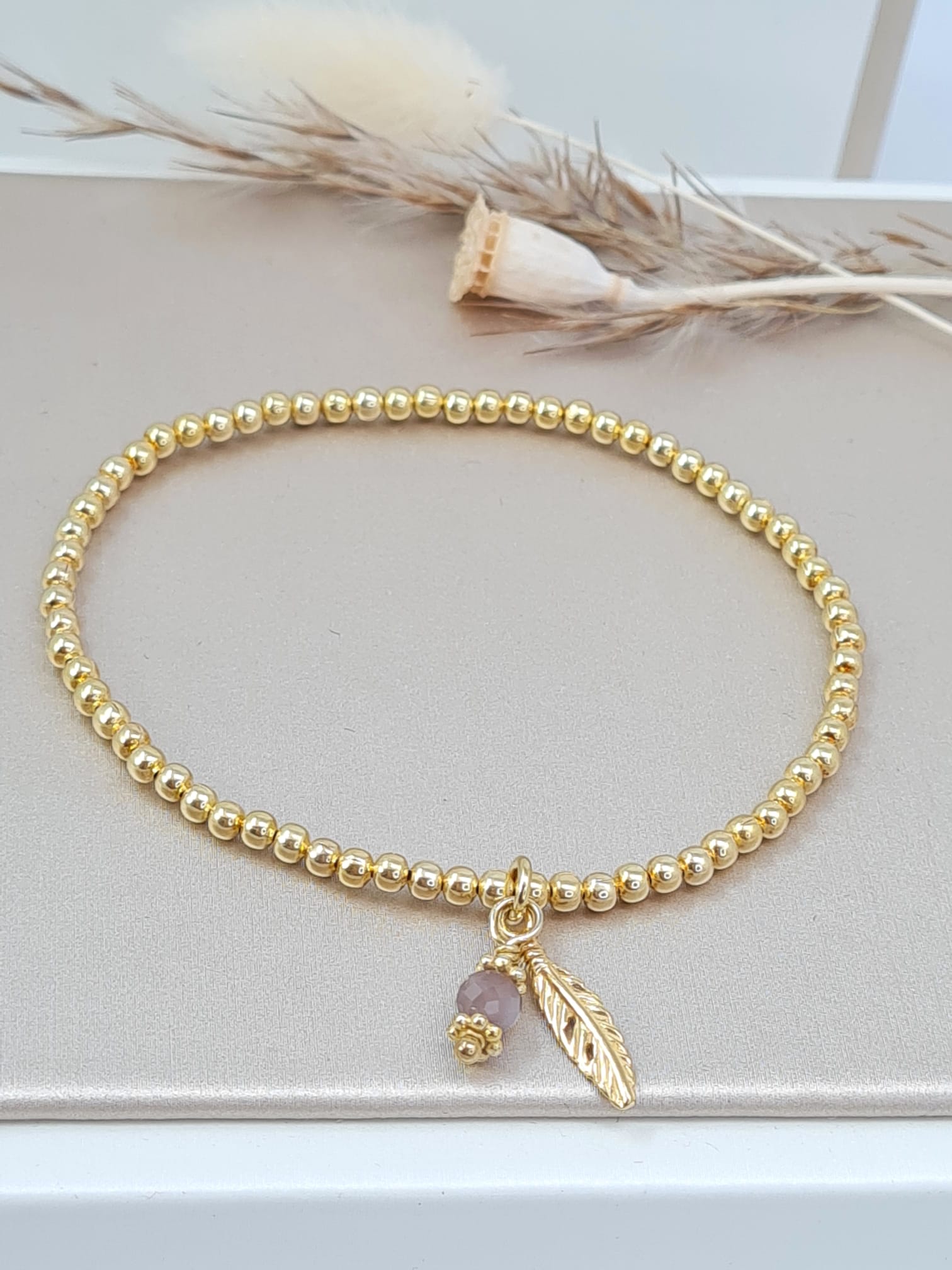 Gold veredeltes Silberarmband mit Feder- und Mondstein Anhänger (DAB 187)